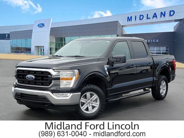 2021 Ford F-150 XLT in Black Metallic — front three-quarter view