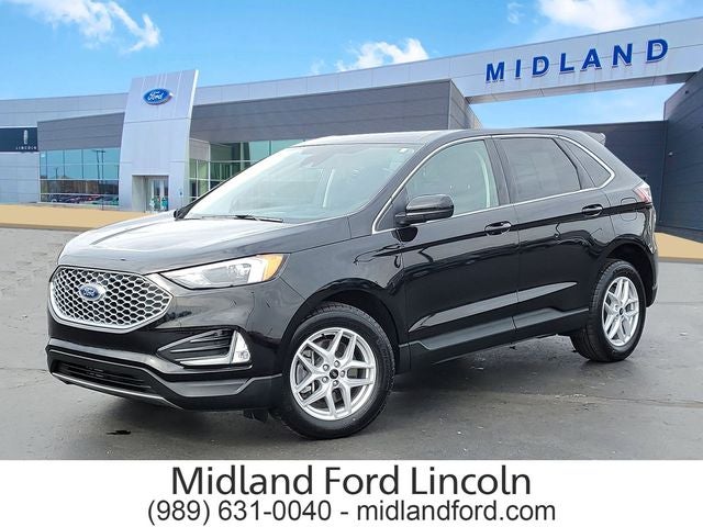 2024 Ford Edge SEL in Black Metallic — front three-quarter view